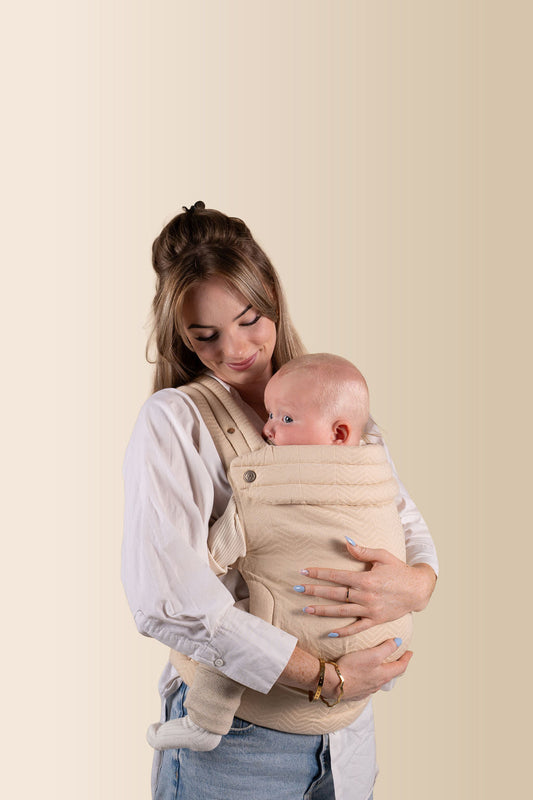 De beste draagzak van 2026 – waarom dichtbij groeien beter is | MOMCIE